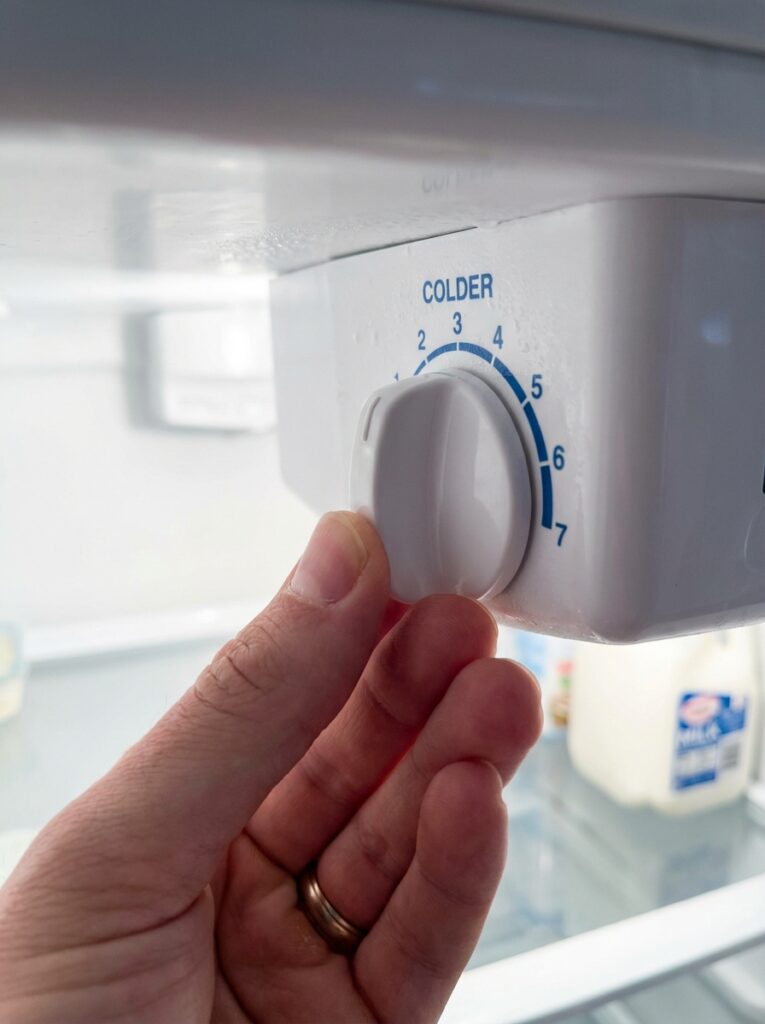 Hand_turning_refrigerator_202603270451
